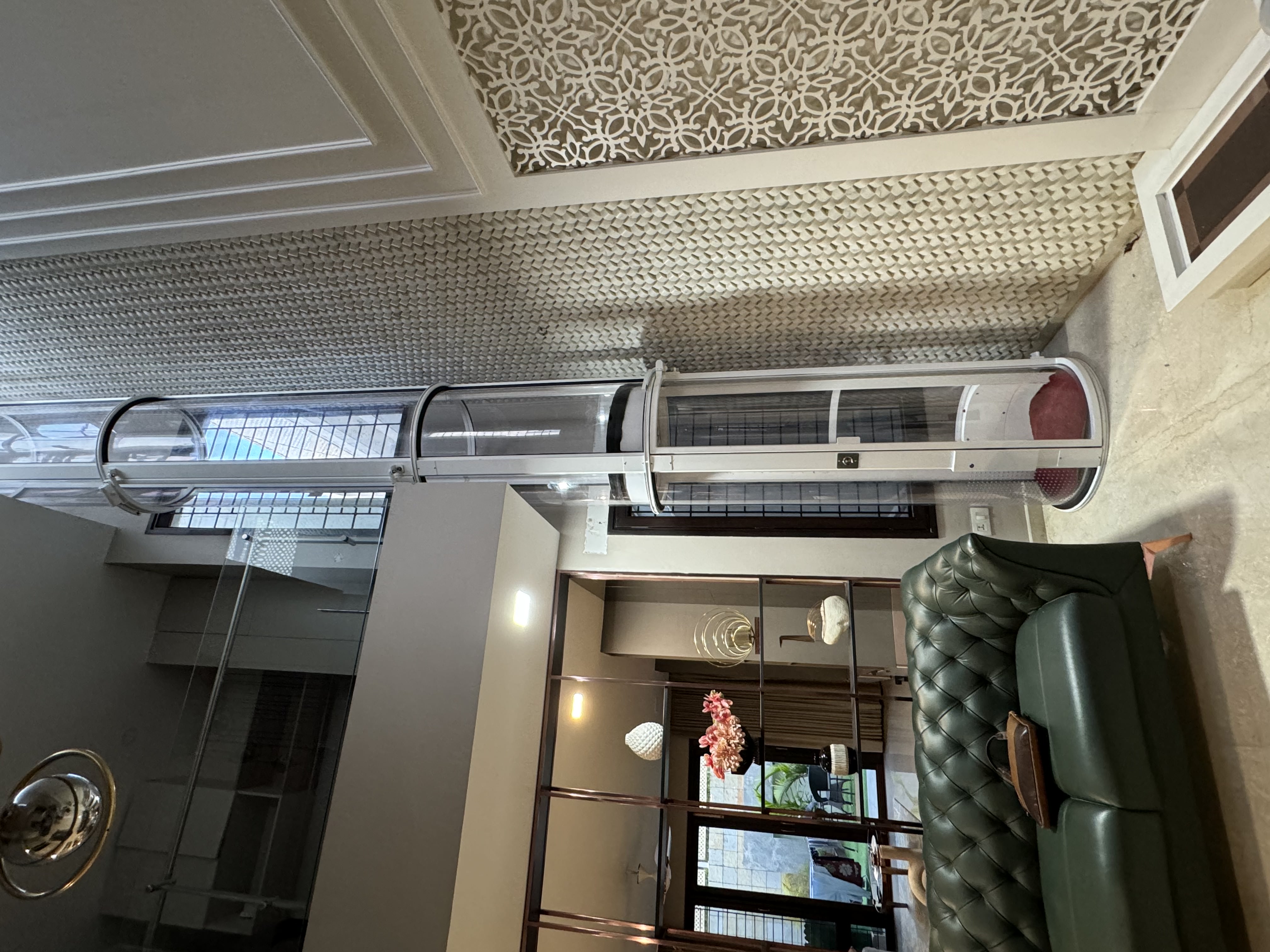 Engineers reviewing elevator cabin